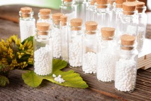 Clear Homeopathic Remedy Vials with cork tops.
